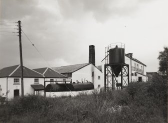 General view from S of distillery.