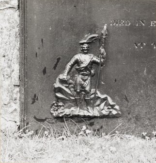 Glenfinnan Monument.  Detail of soldier on cast iron panel in perimeter wall.