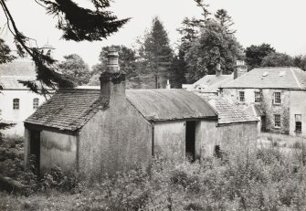 View of wendy house from north west also showing rear of kennels and house
