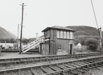 Fort William, Inverlochy, Signal Box
View from N across tracks of signal box.  The tracks in the foreground lead to Mallaig, and those behind the signal box to Glasgow