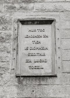 Entrance front, side wing, Gaelic inscribed panel, detail