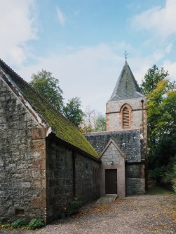 View from NE showing spire and side entrance