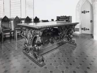 Interior. Detail of Victorian communion table with satyr legs.