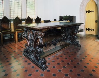 Interior. Detail of Victorian communion table with satyr legs.