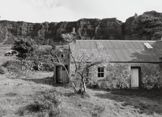 View from W showing surrounding croft and setting