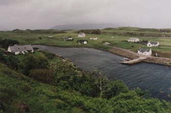 Muck, Port Mor House and Port Mor, Pier Cottage. Hotel, quay, cottage and gear store. View from SW.