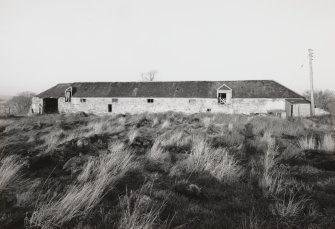 View from South South West of South range with Threshing Barn on right and Granary above pens, stalls and cart shed