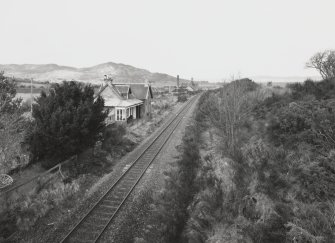 General view of station from ESE, with Balblair Distillery in the background