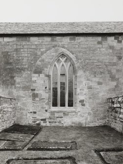 Fearn Abbey.  St. Michael's aisle, view from South showing traceried window and blocked arch.