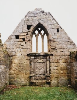 Fearn Abbey.  Ross aisle, view from South showing Ross monument with traceried window above.
