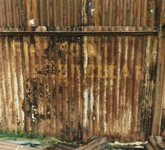 Fearn Airfield, W perimeter area, Mainhill type hangar.  Interior showing surviving detail of painted sign 'Fire Point - Keep Clear'  on wall.