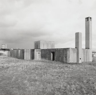Fearn Airfield, Loans of Tullich accommodation camp, gas decontamination centre, view from W showing venting column and water tank.