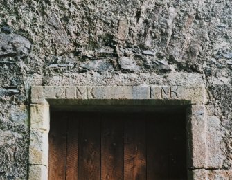 Detail of lintel above door on west gable