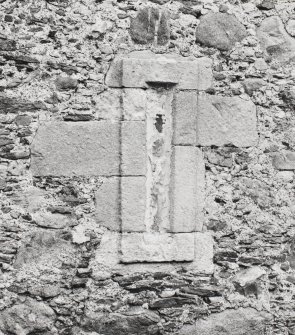 Detail of blocked slit window in south face of barn