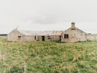 Loans of Tullich (Fearn Airfield accommodation camp).  Stone built 19th century steading with subsequent internal alterations and additional windows resulting from re-use by military during World War II.  View from SE showing two gable end elevations with central section.  Small dovecot on one gable.