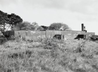 Tain Airfield Operations block, view from SW showing ventilation tower and surviving section of corridors to ablutions block..