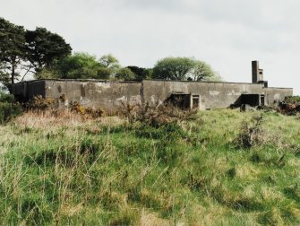 Tain Airfield Operations block, view from SW showing ventilation tower and surviving section of corridirs to ablutions block.