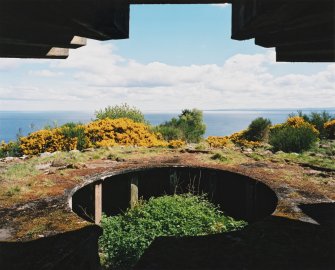 View from W showing gun-pit of S emplacement and part of the canopy.