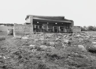 View from SE of western World War II 6-inch gun-emplacement showing stones placed on apron for camouflage.