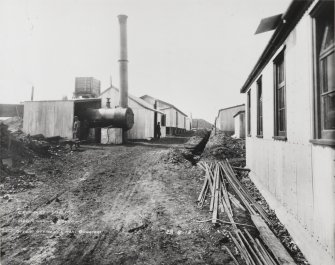 View W showing S side of officers and men's quarters during the construction of the site.