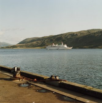 View of "The Odessa" beyond pier on Loch Broom