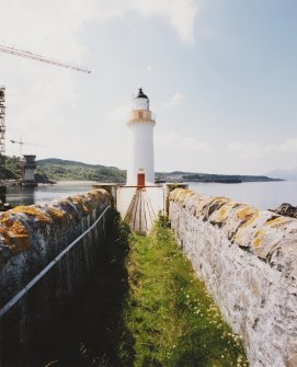 Skye, Eilean Ban, Kyleakin Lighthouse.
General view of lighthouse from North-Esat, showing rubble walls on either side of path, and walkway.