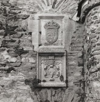 Eilean Donan Castle.
Detail of plaques above entrance to main hall.