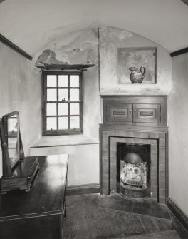 Eilean Donan Castle, interior.
Second floor, dressing room, view of fireplace and window.