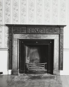 Interior-detail of chimneypiece on North East wall of East apartment on Ground Floor