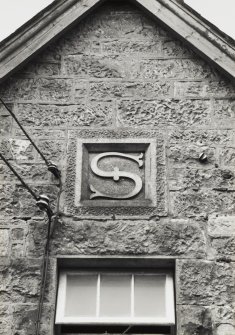 Detail of 'Sutherland' plaque on S gable of W end block of steading