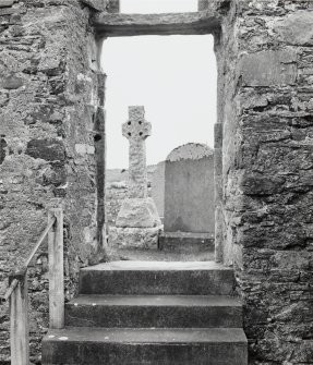 Interior, main doorway on E gable, view from W