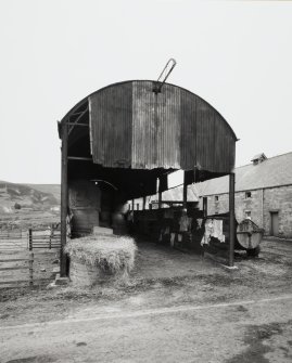 Detailed view from S of end of barn with lifting beam