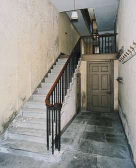 Interior.  Ground floor, east stair, view from west