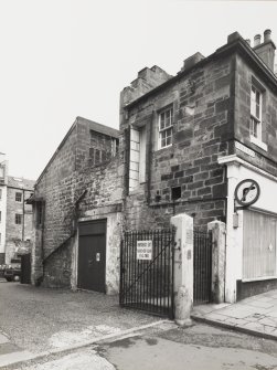 Baker's Place.
View from West North West showing North facade of shops.
