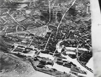 RAF WWII oblique aerial photograph of Edinburgh, Leith Docks taken from the N.  Also visible is the coastal battery on the outer pier, Leith, Leith Walk, Lochend Road and Easter Road.

Print in record
