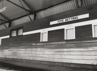 Edinburgh, Beaverhall Road, Powderhall Stadium.
Detail of tote betting windows and video screens in north Stand.