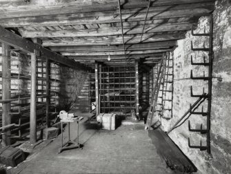 No 15 Blair Street, J & J A Dunn - Interior - view from West of Lower Basement, with steel storage racks