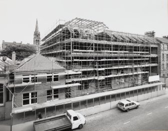 General oblique view of the front of the building under construction for the RCAHMS seen from the North East.