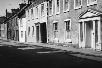 View of street elevations from NE.