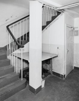 Interior, view of staircase at basement level