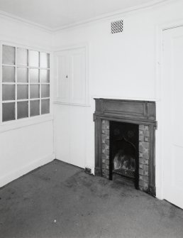 Interior, ground floor view of office showing original fireplace