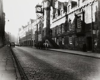 General view of Canongate looking North West, with horse and milk cart in front of Tolbooth