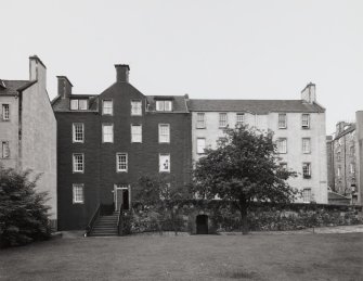 View of Chessel's Court courtyard, West block, view from North East, showing entrance to number 2