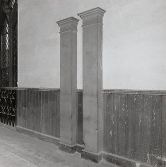 Detail of wooden pilasters on West wall of gallery