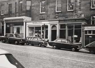 General view of No.s 58a-62 Castle Street, shop frontages from North East