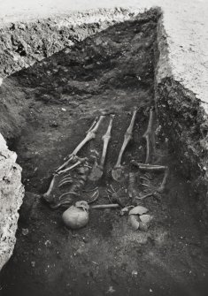 Photograph of two skeletons found in 1900s castle excavations