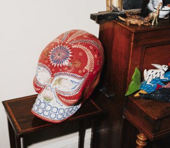First floor, sitting room, painted " skull " and other ornaments, detail