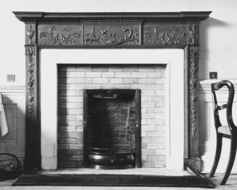 Interior.
Detail of fireplace in dining room (back).