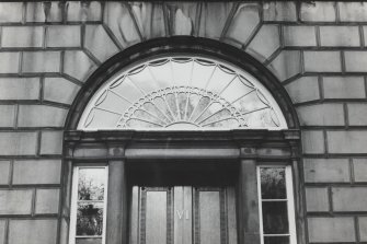Heavily decorated fanlight of B-type
