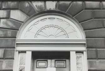 Heavily decorated fanlight of B-type